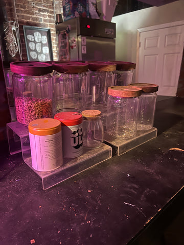 PICK UP ONLY::: 6 glass containers, one with ginger root in it, two small cans of chai tea mix, two plastic tiered stands